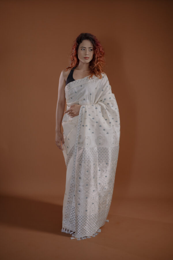 OFF WHITE   MULBERRY BY TUSSAR ASSAM SILK SAREE WITH SILVER COLOR ZARI MAYURISILK